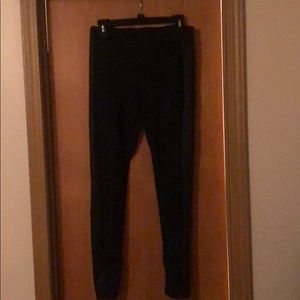 Black leggings with leather stripe